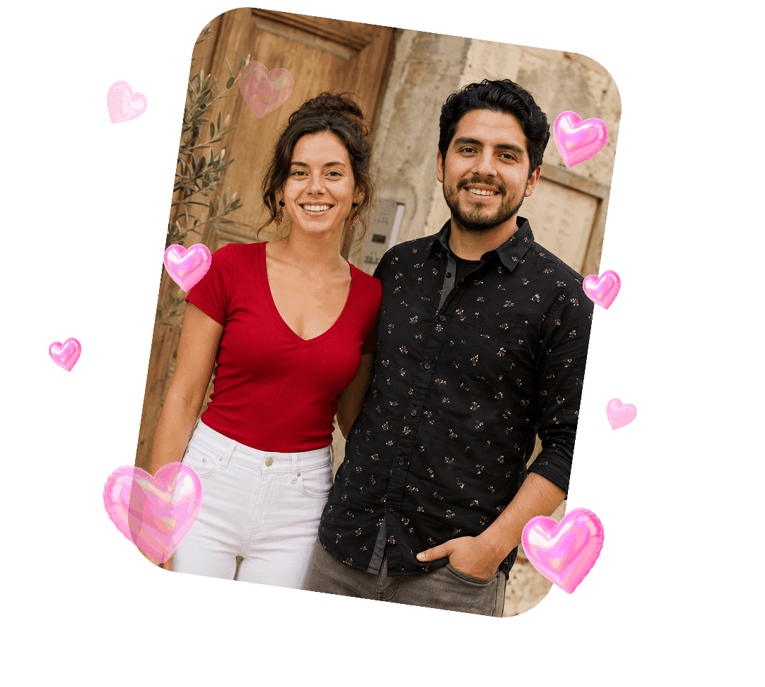 A couple standing close together in front of a wooden door.